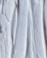 Close-up of a textured white surface with wavy patterns